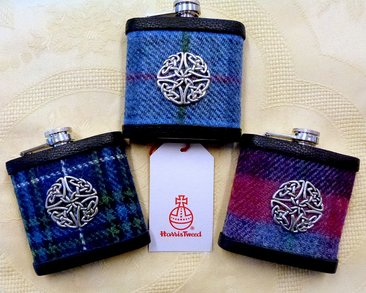Set of three Harris Tweed flasks with hand cast pewter celtic knot