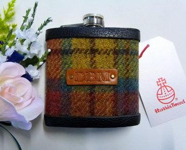 Weathered Ancient Buchanan Tartan Harris Tweed flask with initials