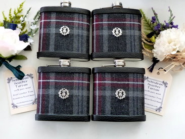 Set of four Hebridean Heather Tartan flasks with thistle