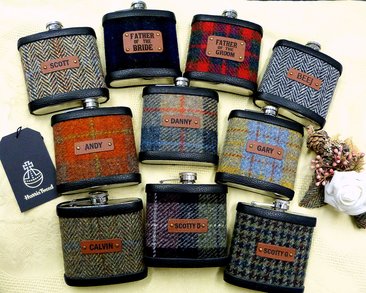 Set of ten Harris Tweed hip flasks