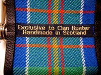 Two Hunter Clan tartan hip flasks 