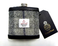 Harris Tweed hip flask in in silver grey, dark grey with blue detail plaid