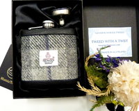 Harris Tweed hip flask in in silver grey, dark grey with blue detail plaid