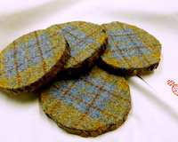 Log slice coasters with Harris Tweed in Blue, mustard yellow and russet plaid, ideal gift handmade in Scotland