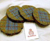 Log slice coasters with Harris Tweed in Blue, mustard yellow and russet plaid, ideal gift handmade in Scotland