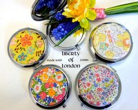 45 x Liberty of London fabric mirrors in velvet pouches