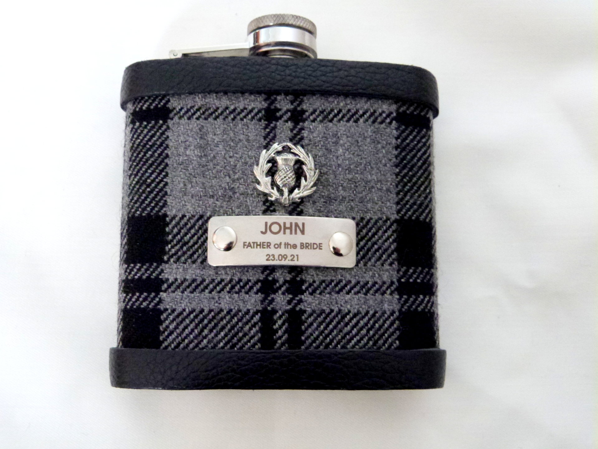 Your family or clan Tartan hip flask with thistle and custom engraved stainless steel tag with any name, date, motto etc.