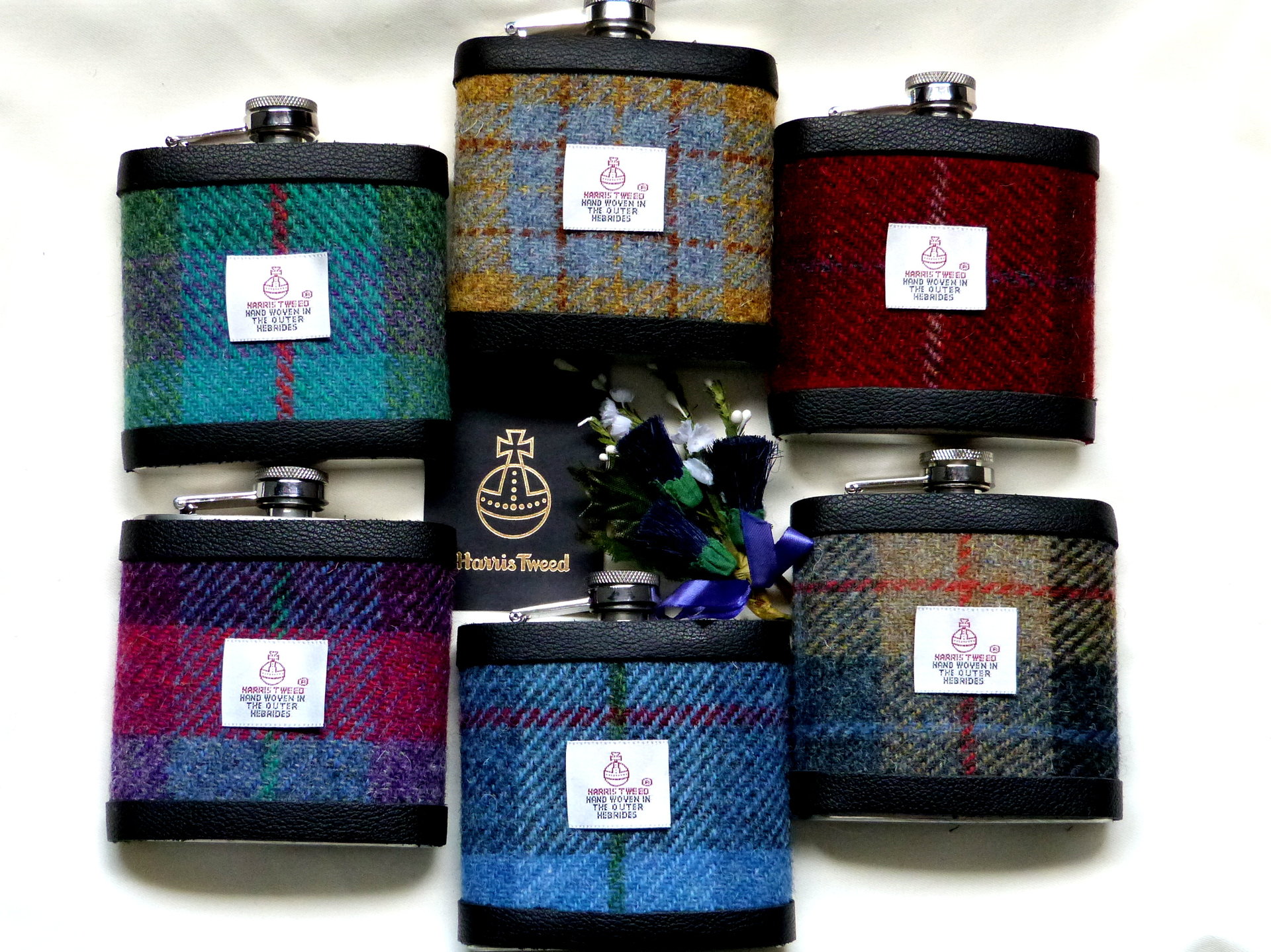 Harris Tweed hip flask in choice of  30 patterns and colours with Orb label handmade in Scotland using handwoven tweed and real leather trim