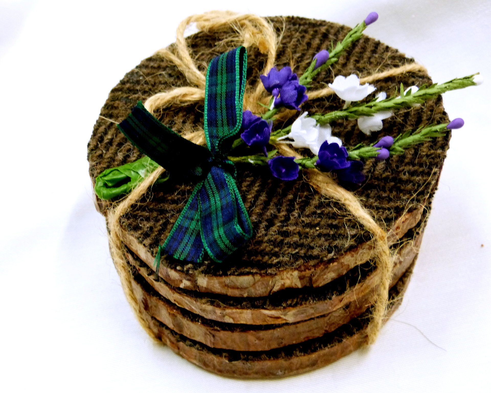 Log slice Harris Tweed rustic drinks coasters, set of four brown herringbone handmade with natural pine wood and pure wool tweed