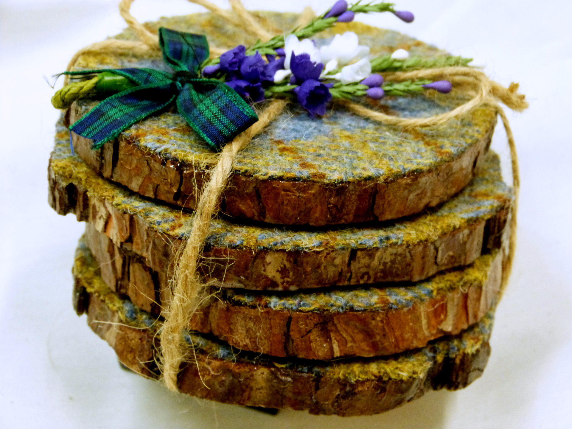 Log slice coasters with Harris Tweed in Blue, mustard yellow and russet plaid, ideal gift handmade in Scotland
