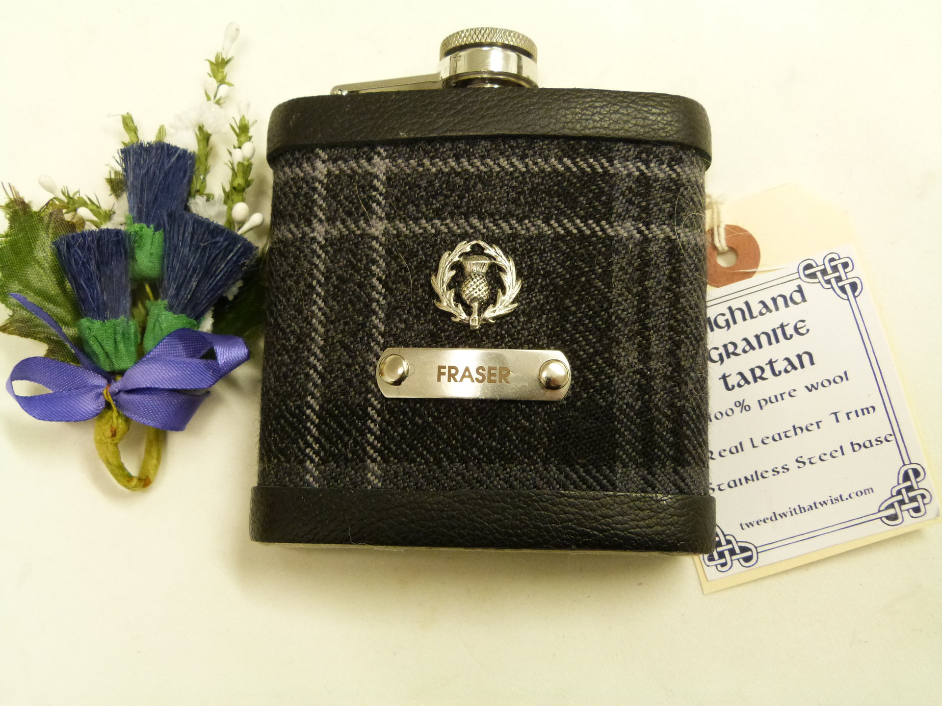Your family or clan Tartan hip flask with thistle and custom engraved stainless steel tag with any name, date, motto etc.