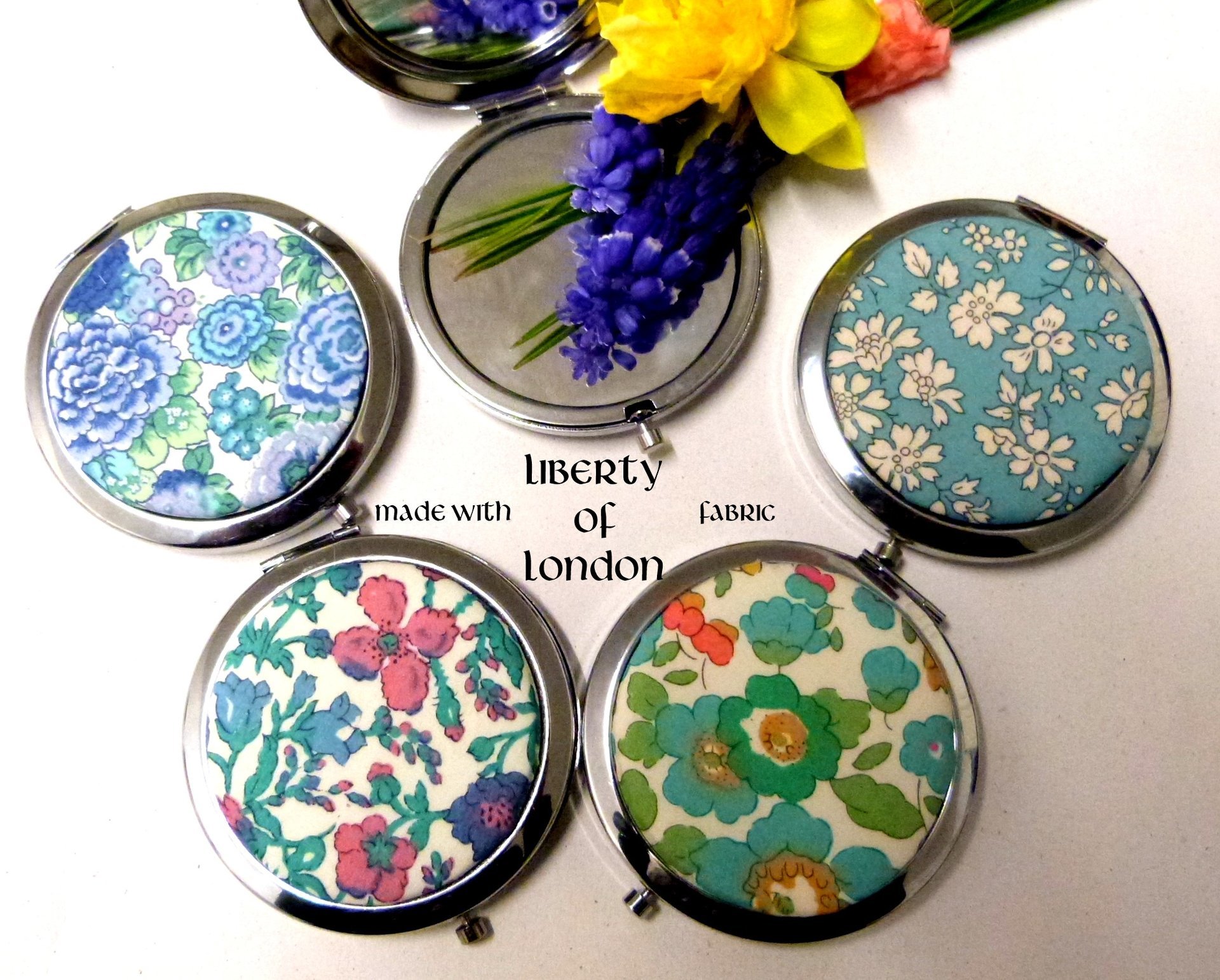 45 x Liberty of London fabric mirrors in velvet pouches