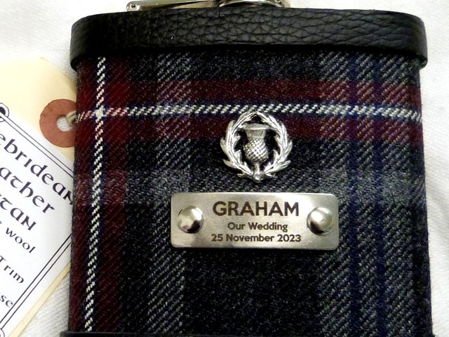 Hebridean Heather Tartan hip flask with thistle and custom engraved stainless steel tag with any name, date, motto etc.